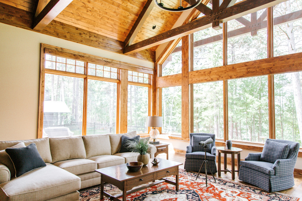 Example of a mountain style home design design in Denver
