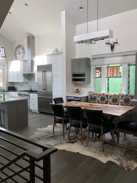 Example of a transitional home design design in Denver