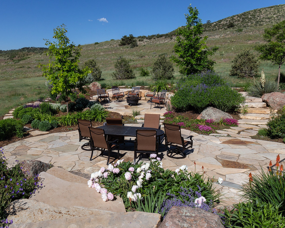 Inspiration for a rustic landscaping in Denver.