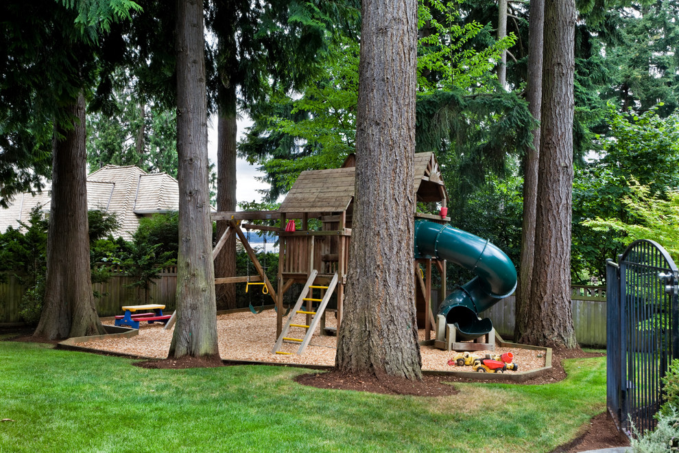 Design ideas for a traditional garden in Seattle with with outdoor playset.
