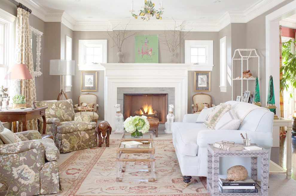 Photo of a traditional formal living room in Denver with grey walls and a standard fireplace.