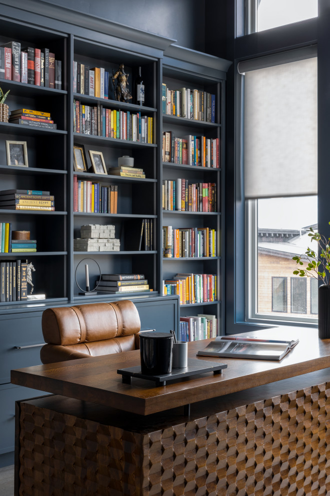 Example of a transitional home office design in Salt Lake City