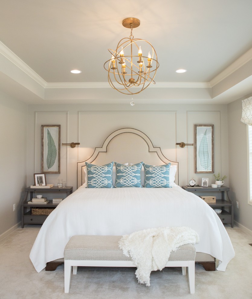Photo of a transitional master bedroom in DC Metro with grey walls and carpet.