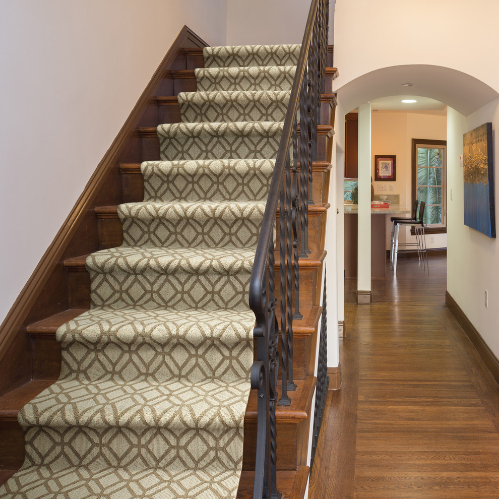 Inspiration for a mid-sized traditional wood straight staircase in Boise with wood risers.
