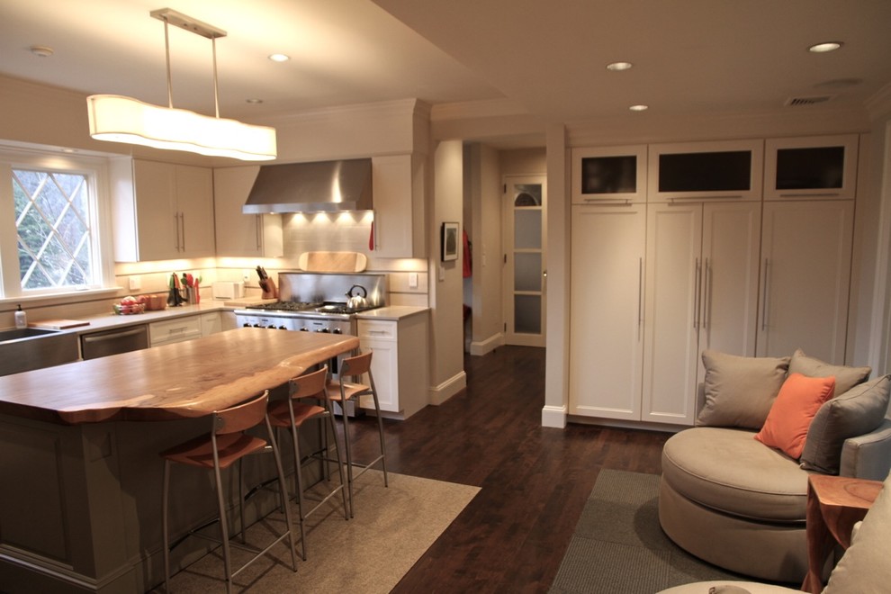 Eat-in kitchen - large transitional u-shaped dark wood floor eat-in kitchen idea in Boston with light wood cabinets