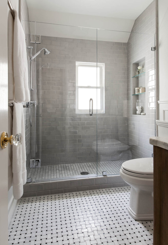 Alcove shower - small transitional master gray tile and subway tile mosaic tile floor alcove shower idea in San Francisco with light wood cabinets, marble countertops, gray walls, a drop-in sink and a two-piece toilet