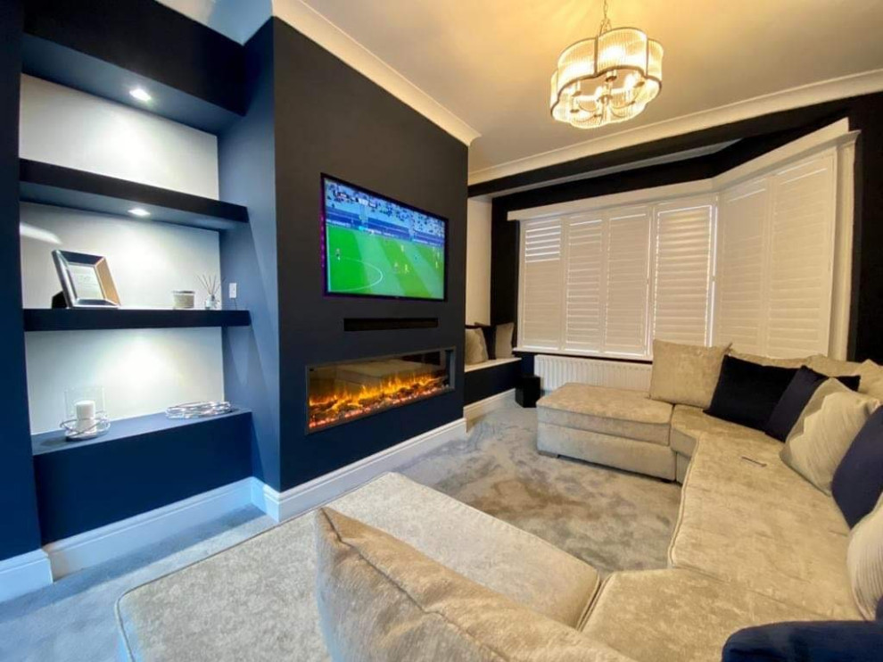 Inspiration for a modern living room in Manchester with blue walls, carpet, no fireplace, a built-in media unit, grey floors and a chimney breast.