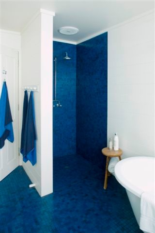 Design ideas for a mid-sized contemporary 3/4 bathroom in Melbourne with a freestanding tub, an alcove shower, blue tile, mosaic tile, white walls and mosaic tile floors.