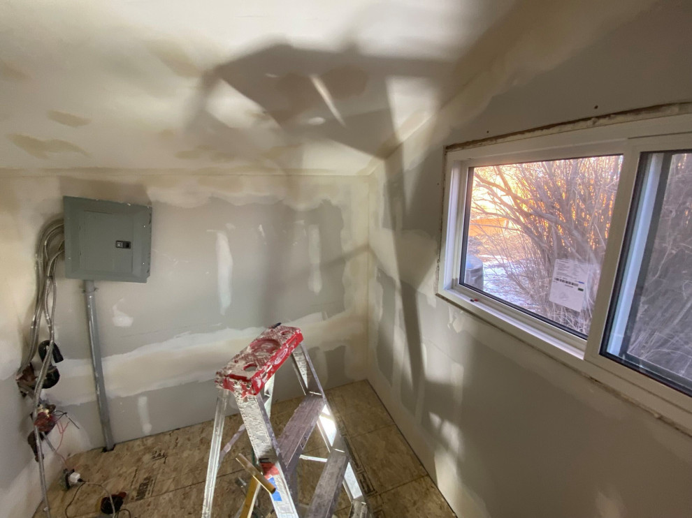 Interior Heating/Drywall/Flooring - Okotoks