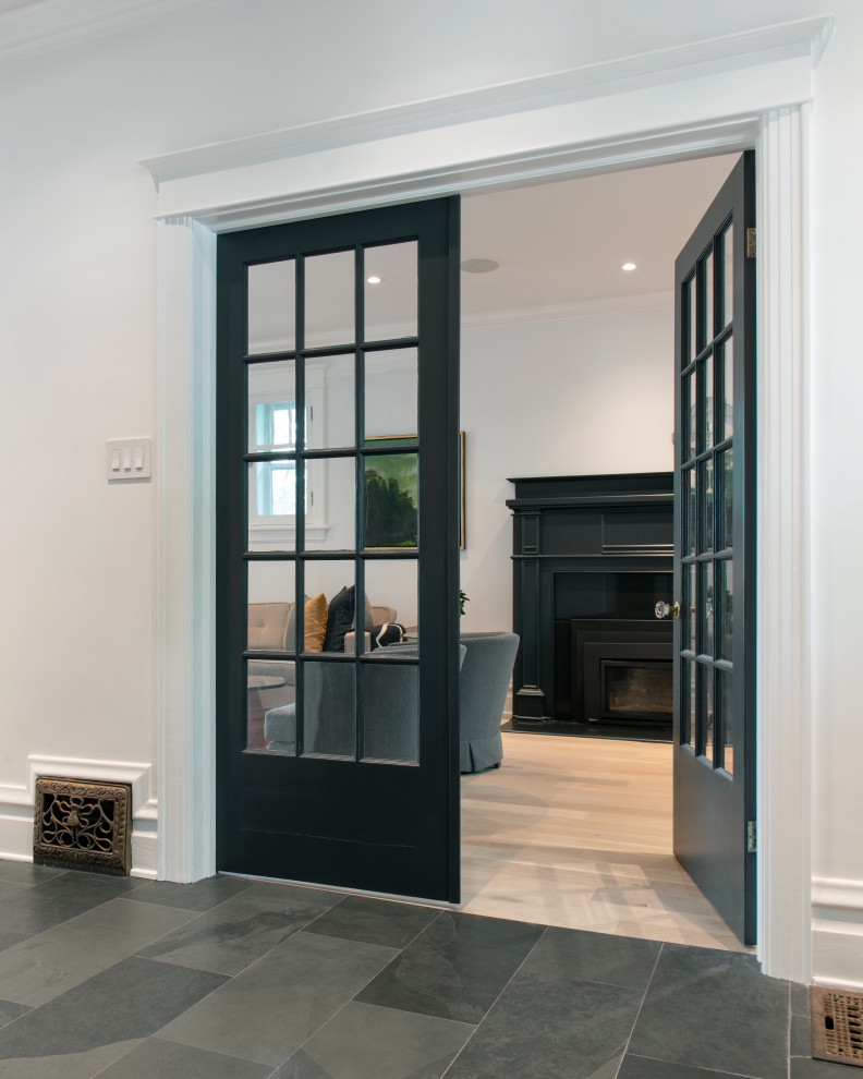 Transitional home design photo in Ottawa