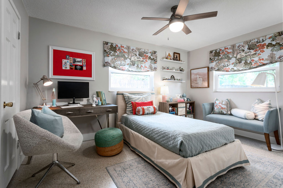 Photo of a small eclectic guest bedroom in Orlando with grey walls.