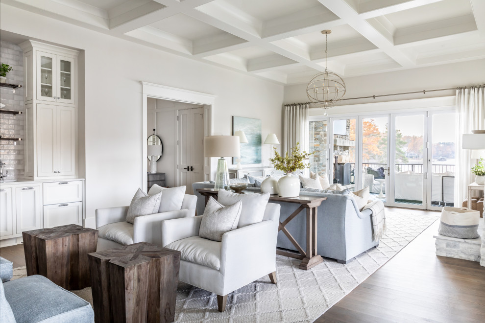 Inspiration for a beach style living room in Charlotte with grey walls, dark hardwood floors, brown floor and coffered.