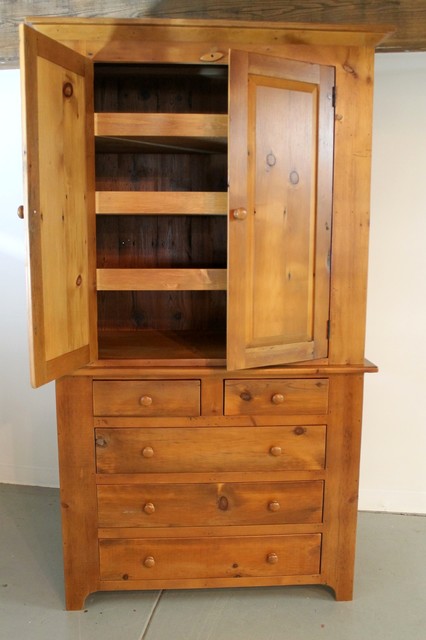 Custom built farmhouse armoire in fruitwood fininsh