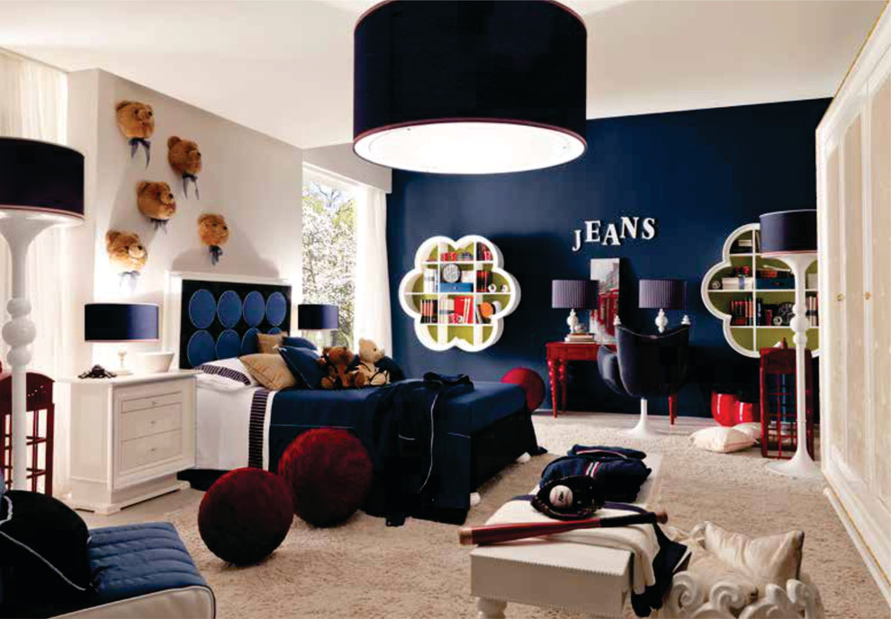Design ideas for a mid-sized modern kids' room for boys in London with carpet and multi-coloured walls.