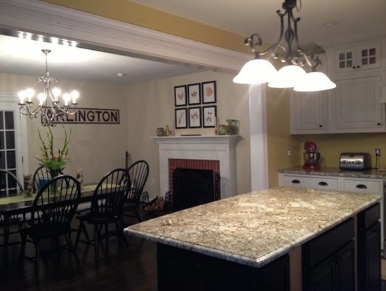 Large u-shaped dark wood floor eat-in kitchen photo in DC Metro with raised-panel cabinets, white cabinets, granite countertops and an island