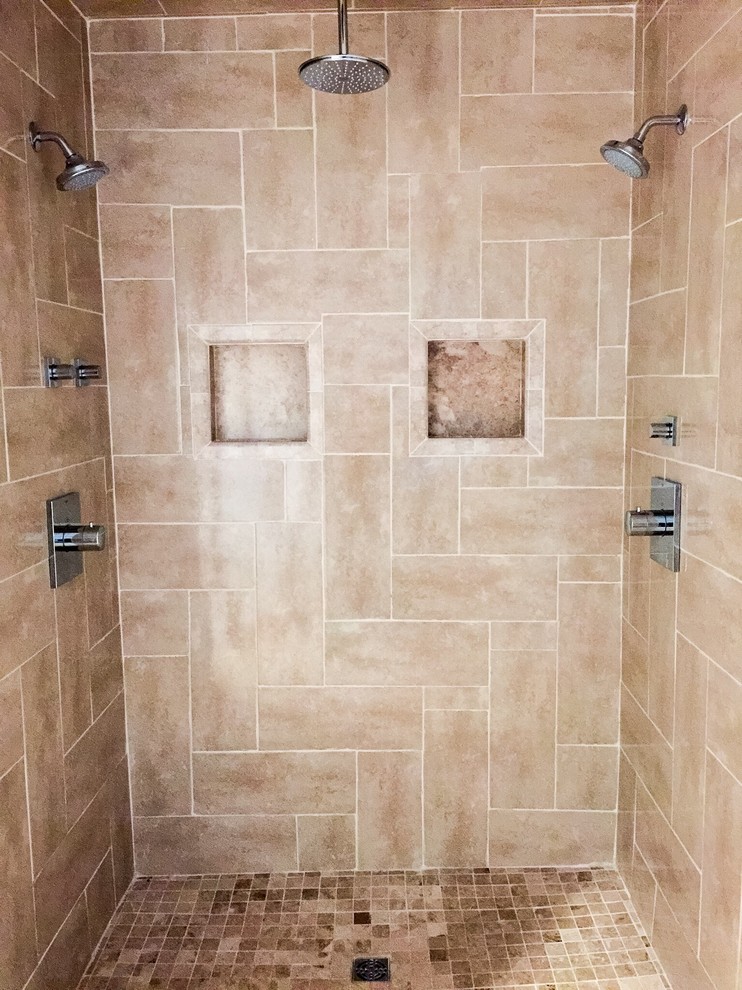 Design ideas for a mid-sized transitional master bathroom in Boston with a double shower, beige tile, ceramic tile and marble floors.