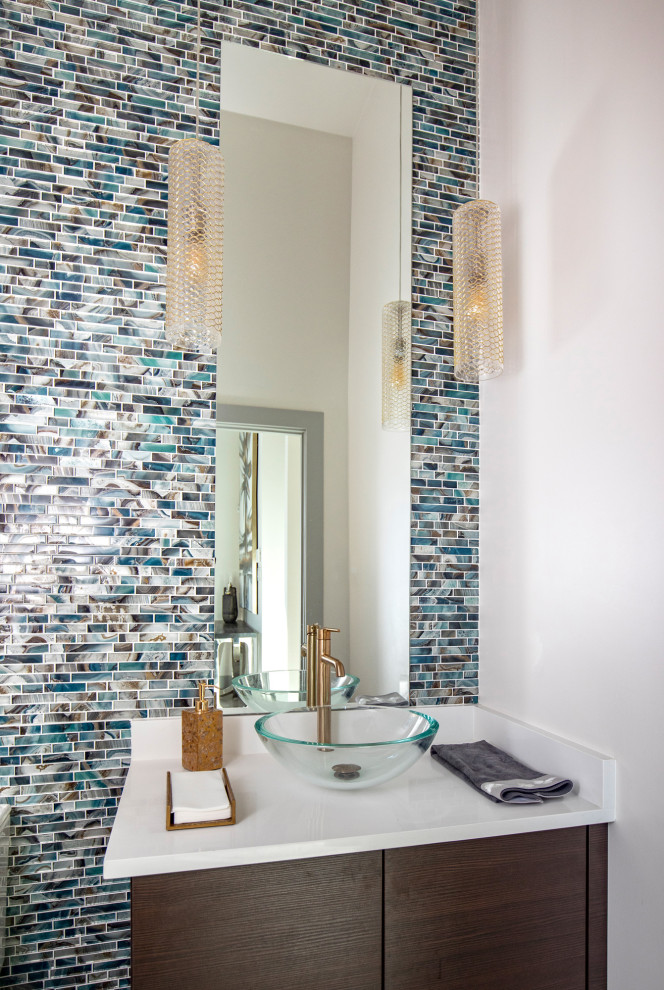 Inspiration for a small contemporary cloakroom in Dallas with flat-panel cabinets, brown cabinets, blue tiles, mosaic tiles, white walls, porcelain flooring, a vessel sink, quartz worktops, brown floors, white worktops and a freestanding vanity unit.