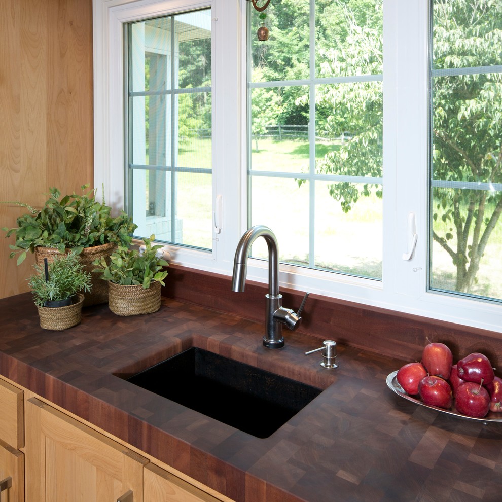Kitchen - transitional kitchen idea in Indianapolis with a drop-in sink and light wood cabinets