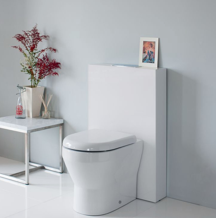 Inspiration for a mid-sized contemporary kids bathroom in Cambridgeshire with flat-panel cabinets, white cabinets, a drop-in tub, a curbless shower, a one-piece toilet, gray tile, porcelain tile, grey walls, marble floors and a pedestal sink.