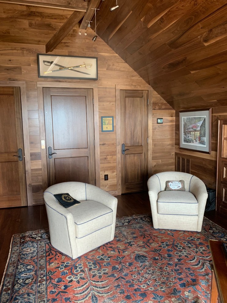 Photo of a large beach style study room in Charleston with brown walls, dark hardwood floors, a freestanding desk, timber and planked wall panelling.