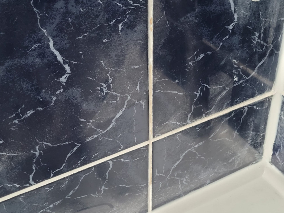 Orange patches hours after grouting shower tiles