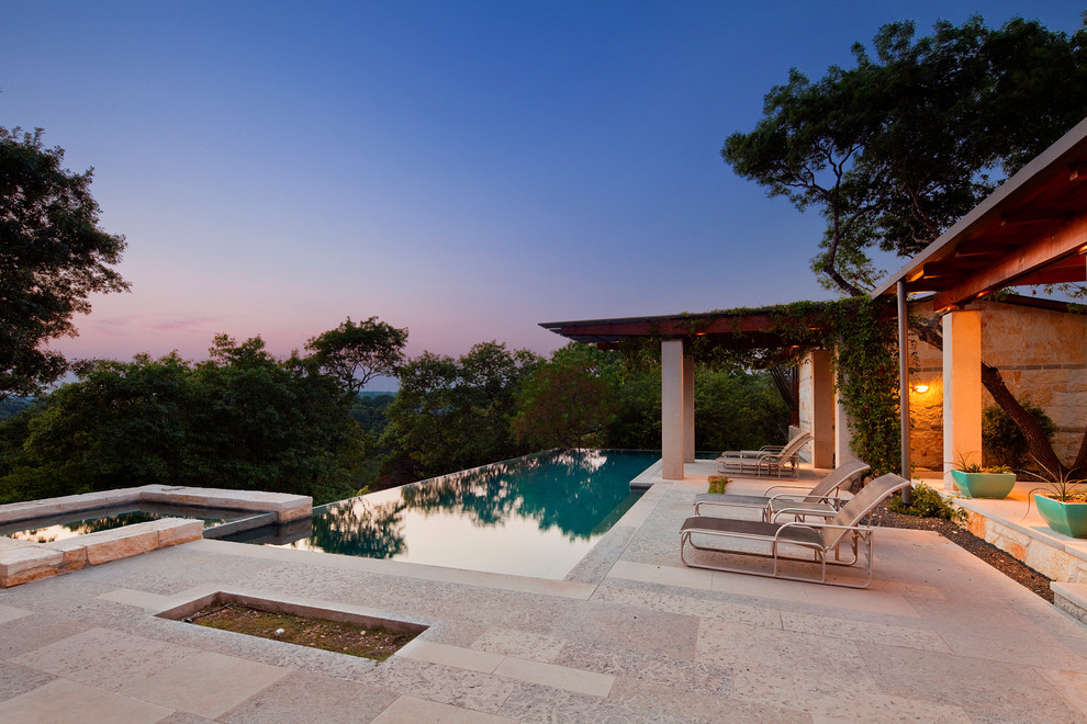 Design ideas for a contemporary infinity pool in Austin.