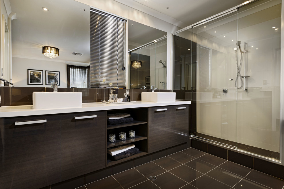 Inspiration for a contemporary master bathroom in Perth with a drop-in sink, flat-panel cabinets, dark wood cabinets, granite benchtops, an alcove shower, brown tile, ceramic tile, grey walls and ceramic floors.