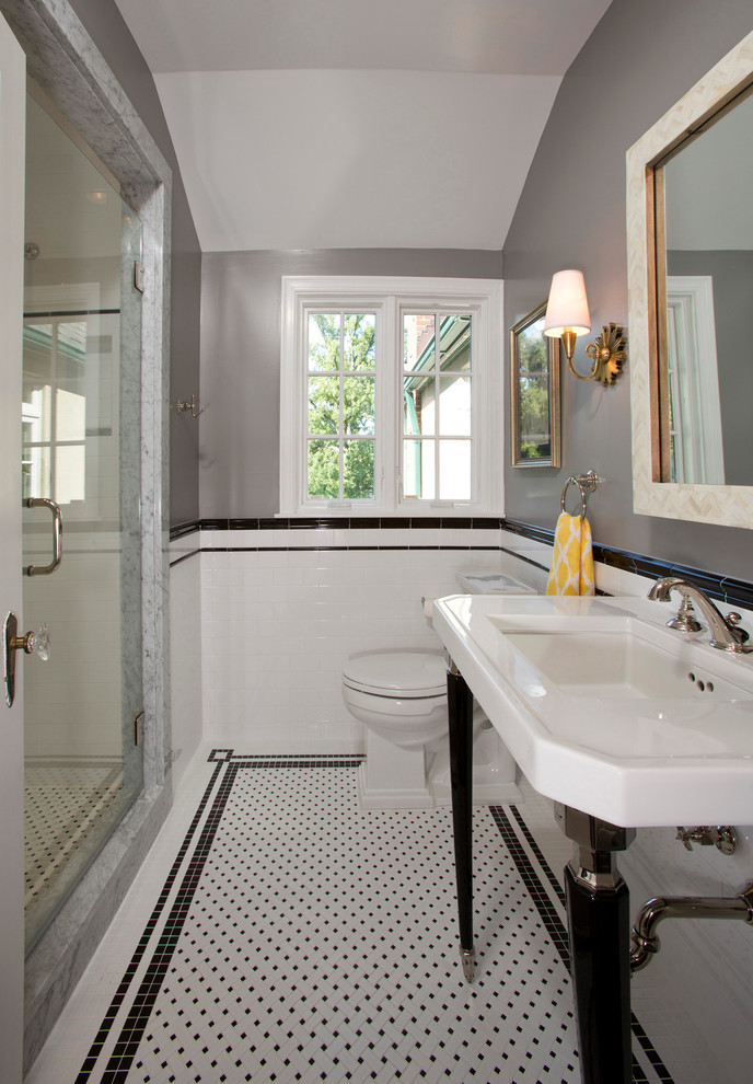 Photo of a small traditional 3/4 bathroom in DC Metro with a console sink, an alcove shower, a one-piece toilet, white tile, mosaic tile, grey walls and mosaic tile floors.