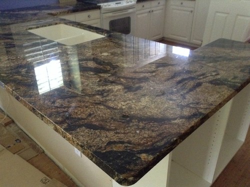 Backsplash ideas for magma gold counters & white cabinets?