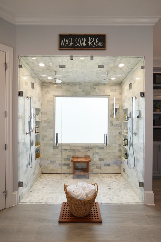 Design ideas for a large traditional master bathroom in Atlanta with shaker cabinets, grey cabinets, a curbless shower, a bidet, gray tile, marble, grey walls, porcelain floors, an undermount sink, engineered quartz benchtops, brown floor, a hinged shower door and white benchtops.