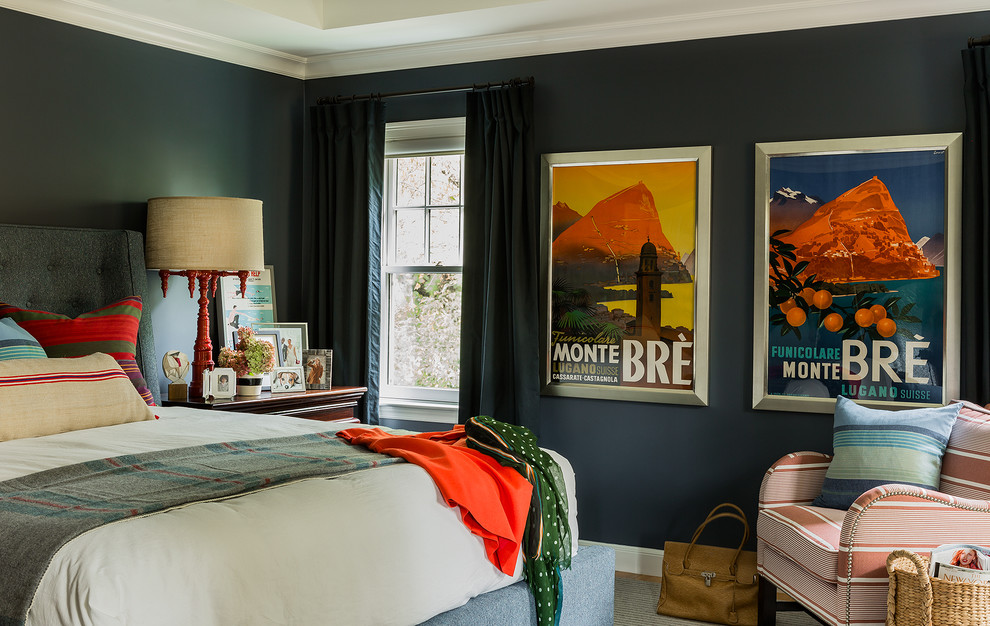 This is an example of an eclectic master bedroom in Boston with black walls and no fireplace.