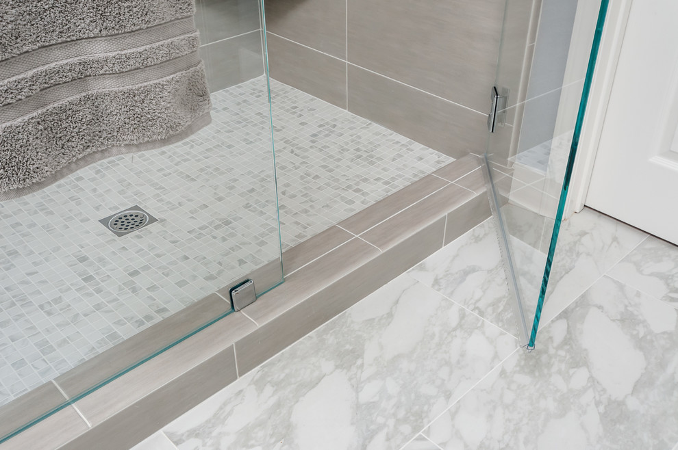 This is an example of a large transitional master bathroom in San Francisco with an undermount sink, shaker cabinets, white cabinets, engineered quartz benchtops, gray tile, porcelain tile, grey walls and porcelain floors.