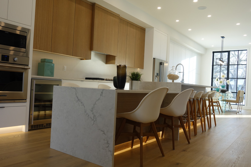 Transitional home design photo in Calgary