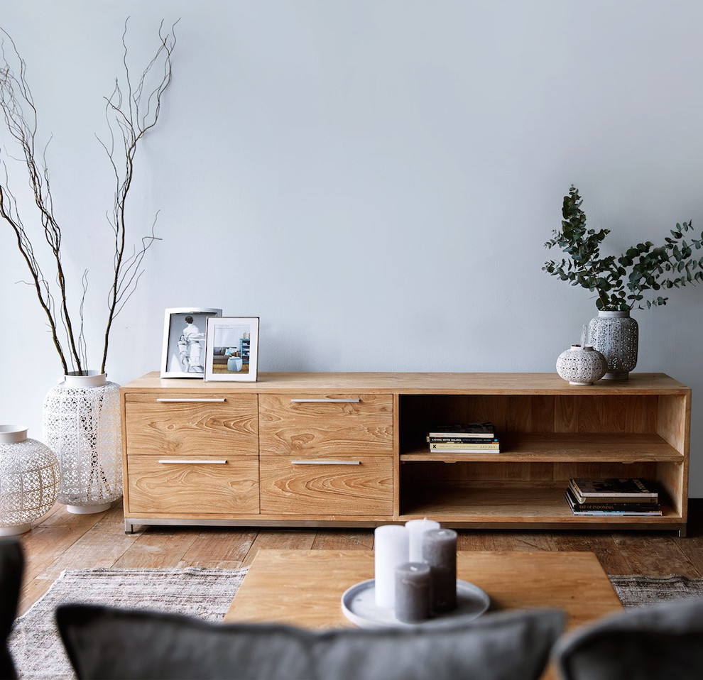 Inspiration for a mid-sized scandinavian enclosed living room in Singapore with grey walls and dark hardwood floors.