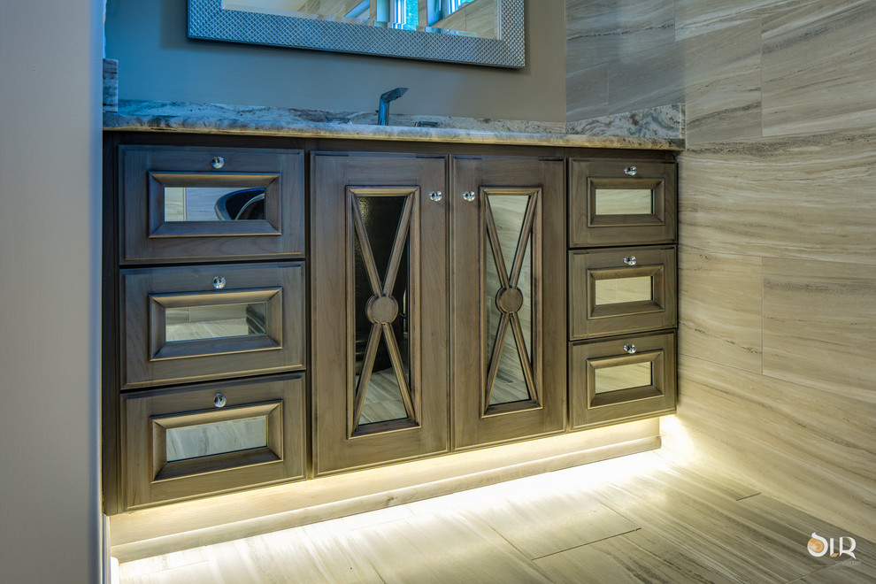 Inspiration for a transitional master dark wood floor and beige floor freestanding bathtub remodel with flat-panel cabinets, light wood cabinets and gray walls