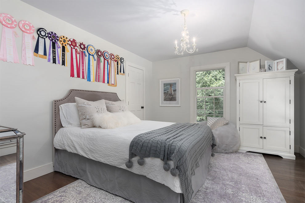 Photo of a country bedroom in Toronto with grey walls, dark hardwood floors and brown floor.