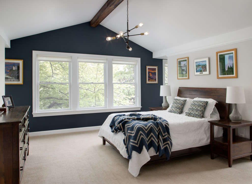 Large transitional master bedroom in DC Metro with blue walls, carpet, beige floor and vaulted.