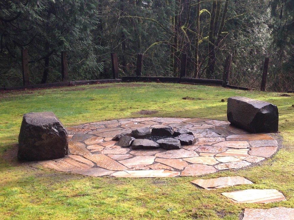 Inspiration for a rustic landscaping in Seattle.