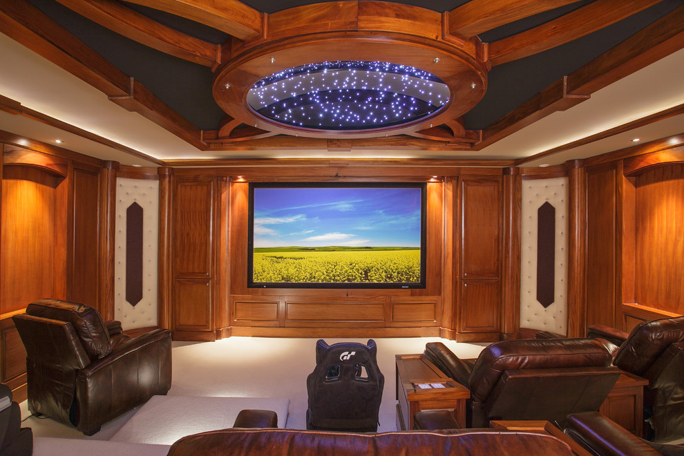 Photo of a traditional enclosed home theatre in Vancouver.