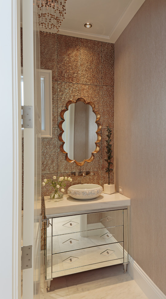 Small beach style powder room in Other with furniture-like cabinets, multi-coloured tile, metal tile, multi-coloured walls, marble floors, a vessel sink, granite benchtops and multi-coloured floor.