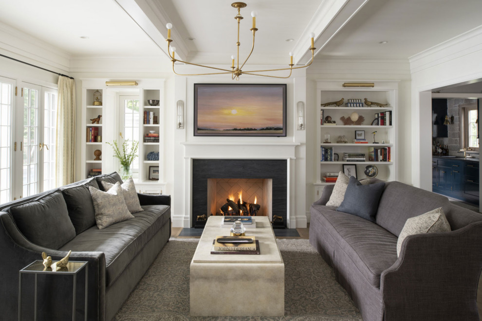 Living room - traditional exposed beam living room idea in Minneapolis with white walls, a standard fireplace and a wall-mounted tv