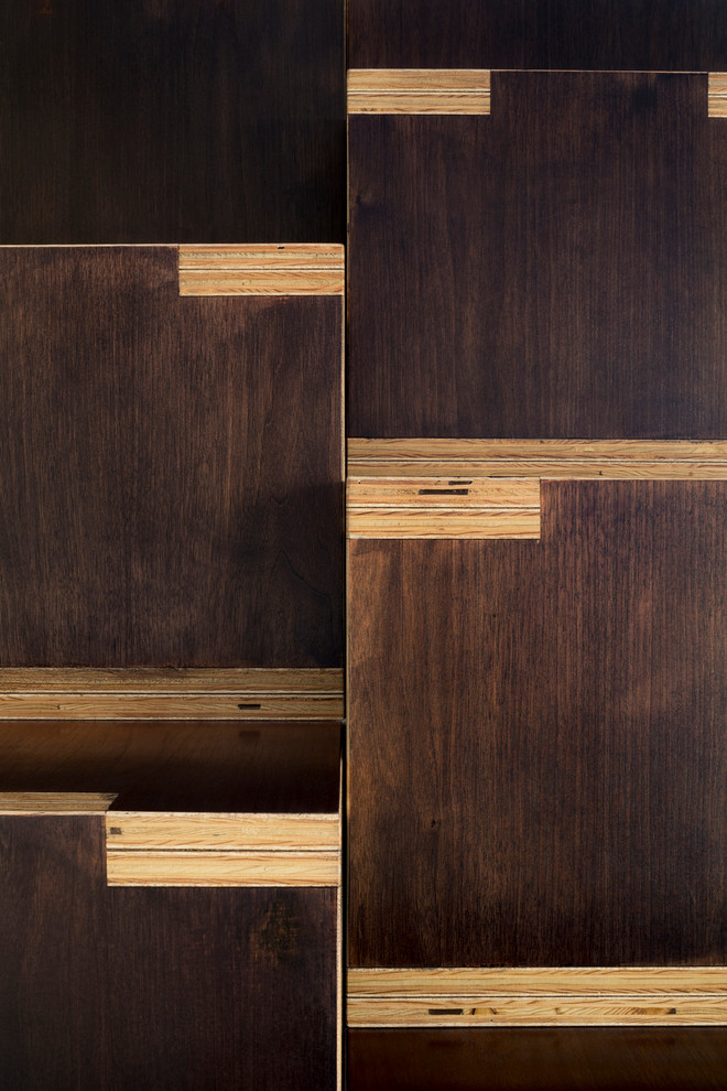 Staircase - small contemporary wooden staircase idea in New York with wooden risers