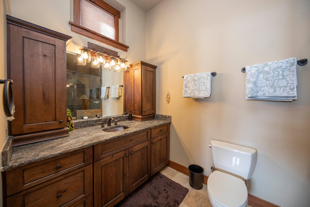 Example of a mountain style home design design in Denver