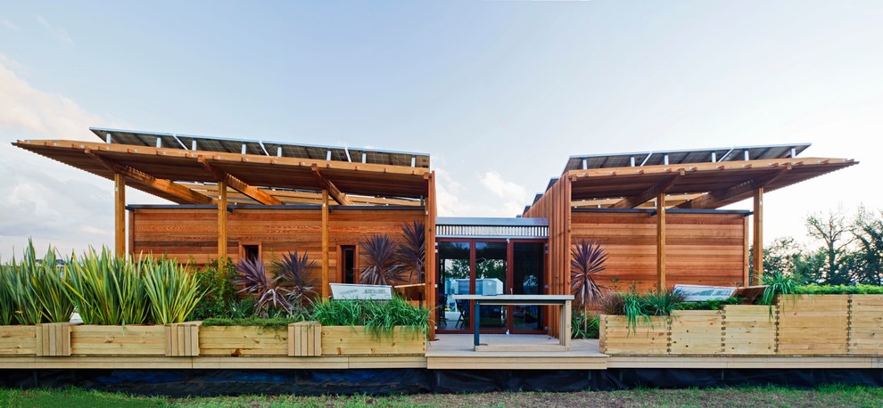 Example of a small beach style home design design in DC Metro