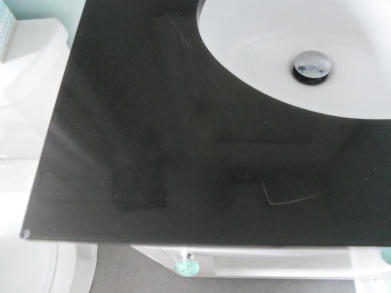 how to repair or inexpensively replace vanity top?