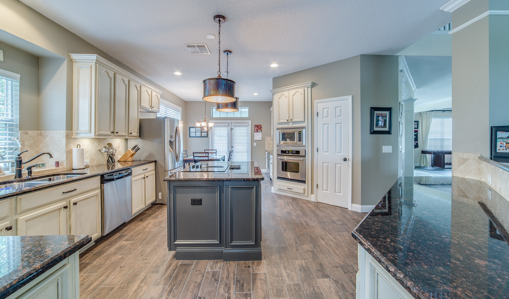 Example of a transitional kitchen design in Orlando