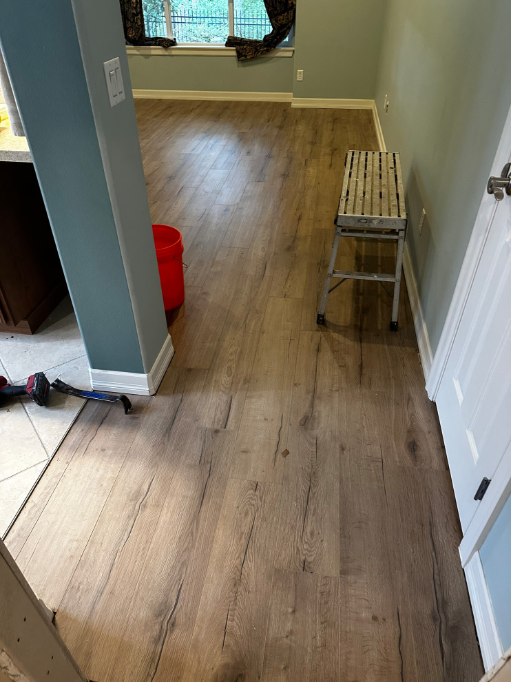 ADA Bathroom/Garage Retrofit and New Flooring