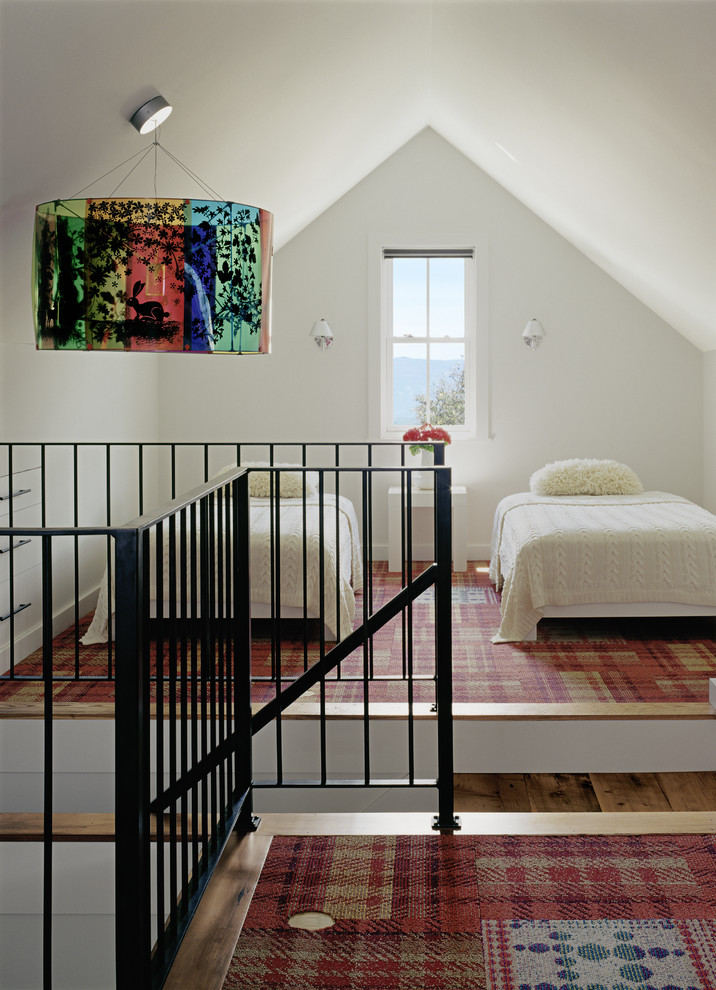 Design ideas for a transitional loft-style bedroom in Denver with carpet.
