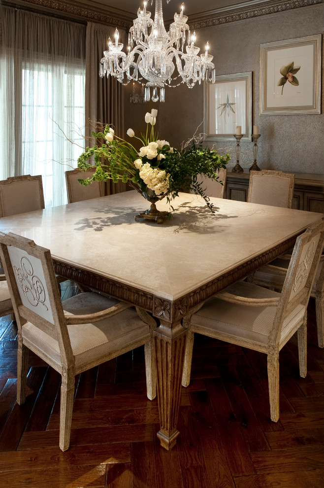 This is an example of a large traditional separate dining room in DC Metro with beige walls, dark hardwood floors, no fireplace and brown floor.