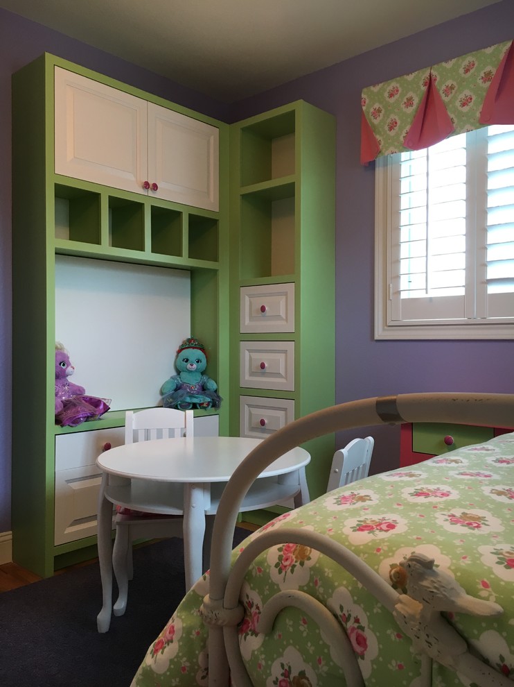 Design ideas for a small traditional kids' room for girls in Denver with purple walls and dark hardwood floors.